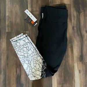 Brand new black leggings with patterned white ends
